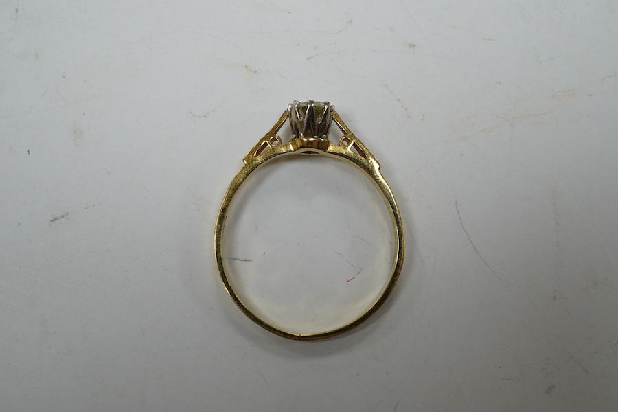 A modern 18ct gold and solitaire diamond set ring, size V, gross weight 3.1 grams. Condition - fair